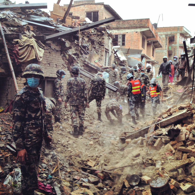 Nepalese army members search for survivors in the city of Buaktapur, eight kilometres from Kathmandu. The devastating earthquake of Saturday 25th April was the worst to hit Nepal in 80 years. The death toll is expected to reach 10,000, with hundreds of thousands more people in desperate need of food, medicine and shelter.