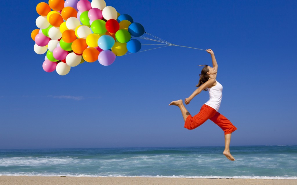 Youngster-girl-with-balloons-happy